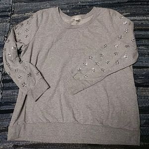 Forever 21 grey and bedazzled sleeve sweat shirt.